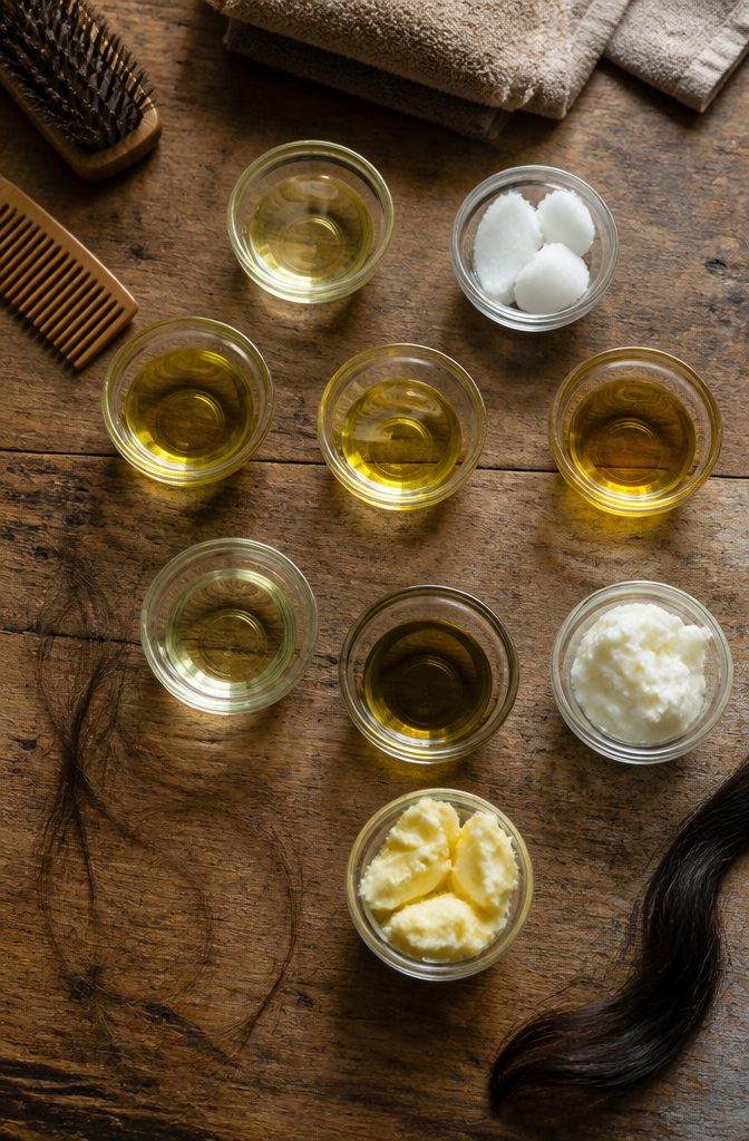 Hair oil article photograph showing hair and scalp