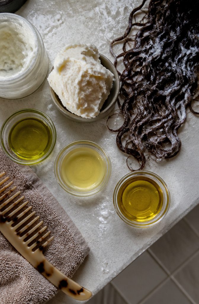 Hair oils and butters used as sealants after leave-in conditioner