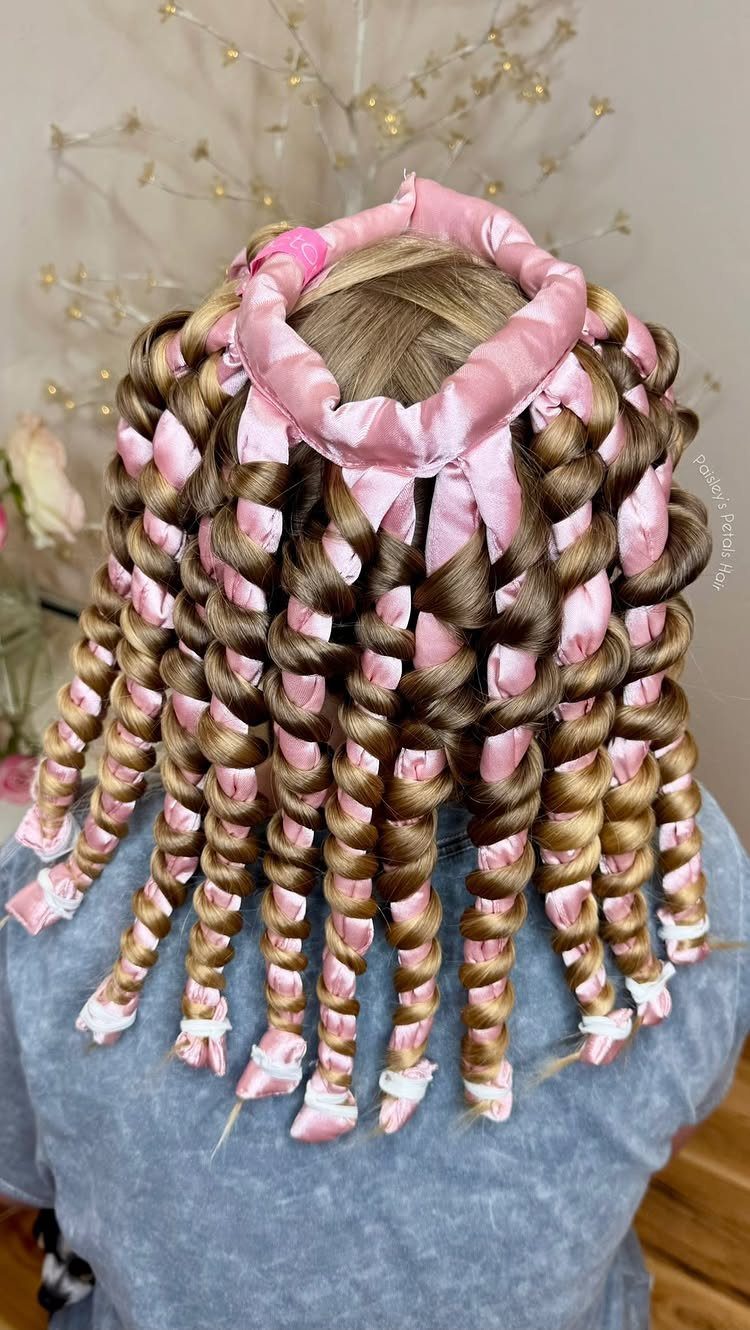 Light brown hair curled with pink satin heatless curling ribbons and headband